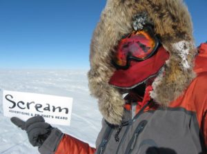 Scream sign on snowy mountain