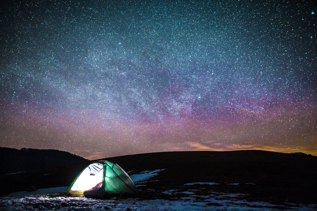 Camping tent under stars
