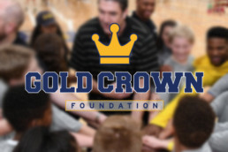 Gold Crown Foundation logo on blurry team photo