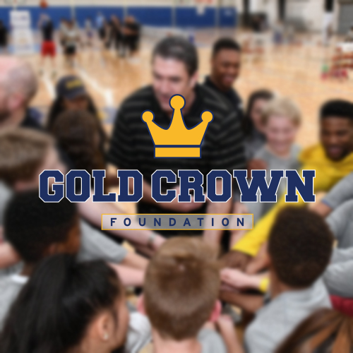 Gold Crown Foundation logo on blurry team photo