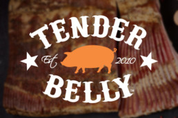 Blurry image of bacon with Tender Belly logo